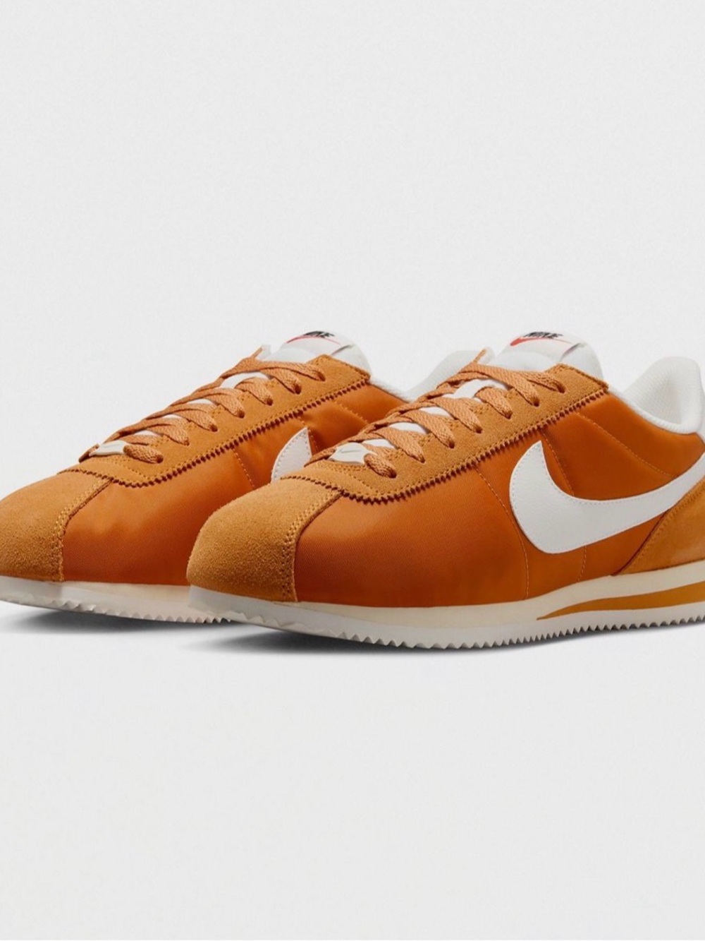 Nike Men’s Orange and White Retro Runner Sneakers